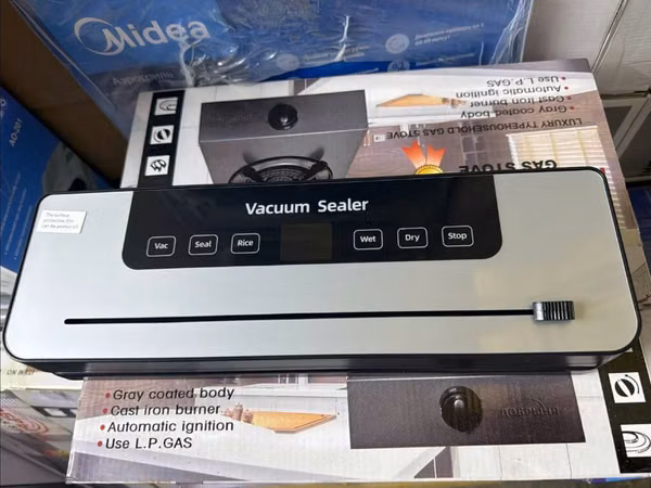 Вакууматор Vacuum Sealer — настольный прибор для упаковки продуктов в